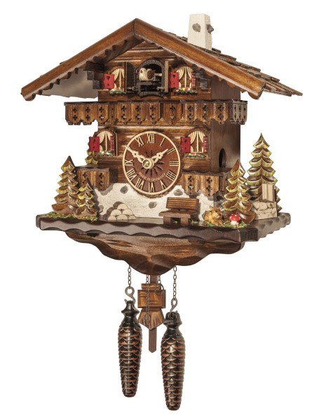 Chalet style cuckoo clock with trees and a deer